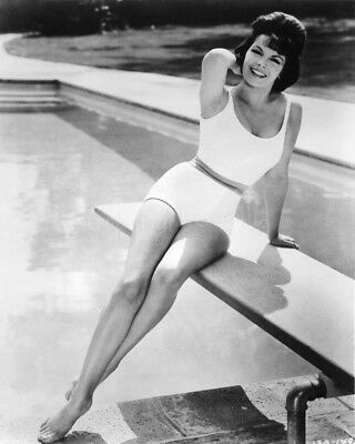 Annette-Funicello-16x20-Poster-in-swimsuit-posing-on-diving-board.jpg